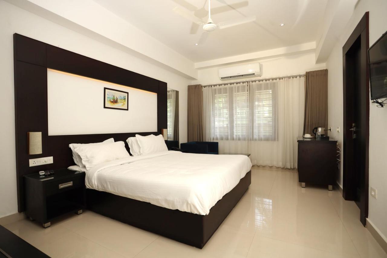 Loveland Residency Коччи Экстерьер фото